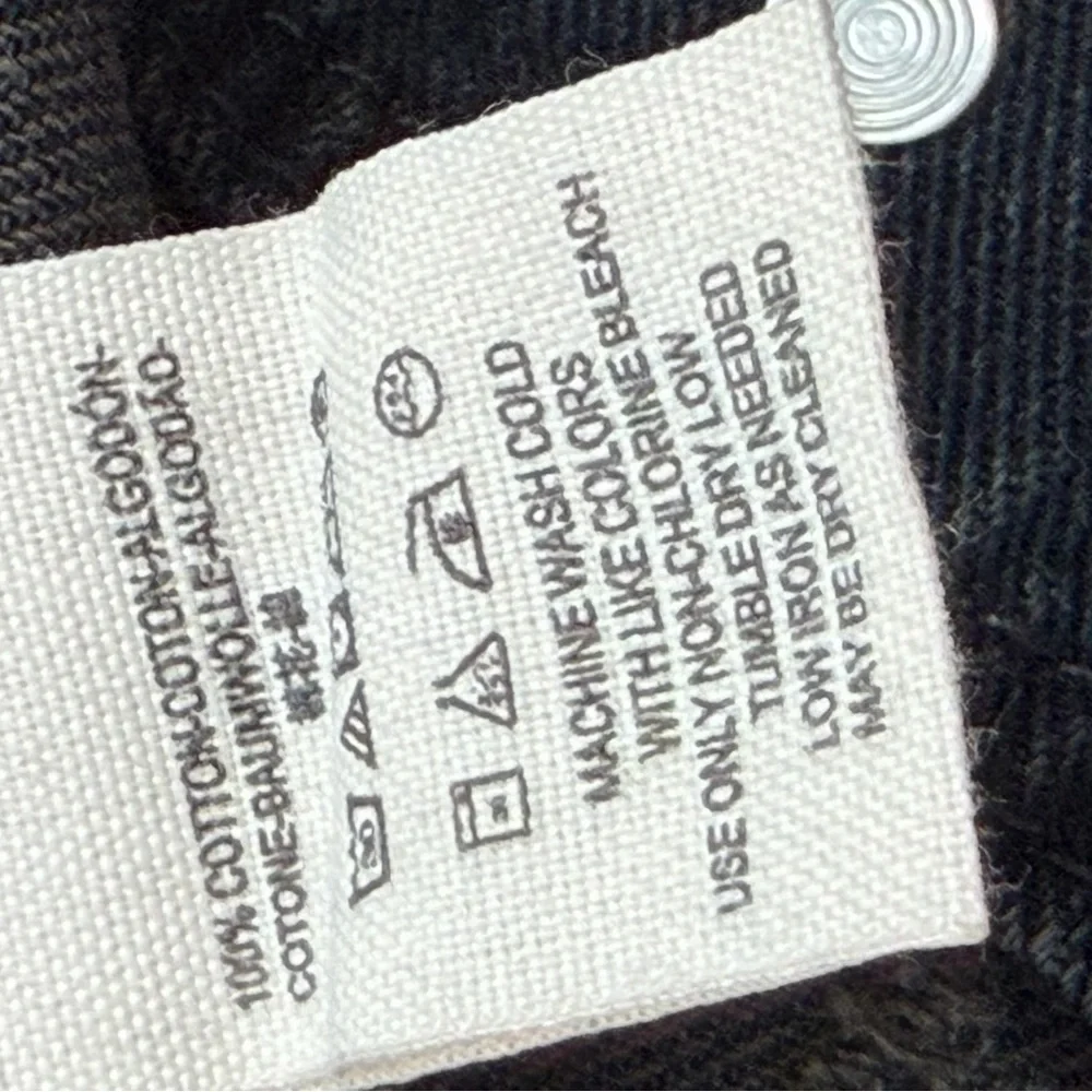 Free People distressed Black Jean Jacket with charcoal Sleeves